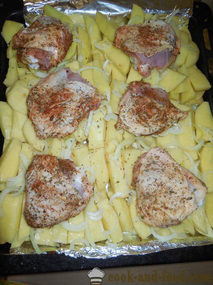 Κοτόπουλο μηρό με πατάτες στο φούρνο - πώς να μαγειρεύουν ένα νόστιμο κοτόπουλο μηρούς με πατάτες, μια βήμα προς βήμα φωτογραφίες συνταγή